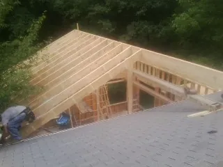 Framing a new roof addition that ties into an existing shingle roof in Baconton